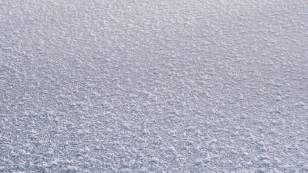 Texture of ice of frozen lake in sunlightの写真素材