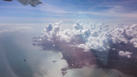 Skyline View above the Clouds from air planeの写真素材
