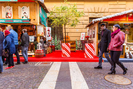 BUDAPEST, HUNGARY - November 23, 2019: Tourists and local people enjoying the beautiful Christmas Market at St. Stephens Square in front of the St. Stephens Basilica.のeditorial素材