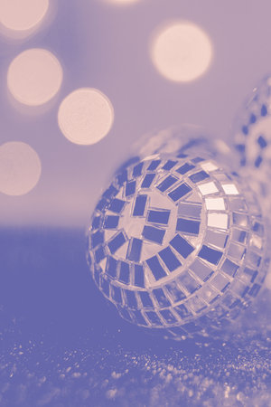 Close-up Crystal ball Decorated on Christmas night on a shiny background. Colors of year 2022 - Very Periの写真素材