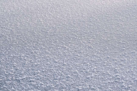 Texture of ice of frozen lake in sunlightの写真素材
