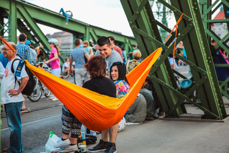 Budapest, Hungary - June 18, 2017: Unidentified people enjoying summer on Liberty Bridge, one of oldest bridge in Hungarian capital. The bridge closed for transport on weekends.のeditorial素材