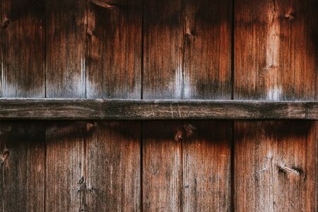 Texture of vertical mahogany old wood with cross beamの写真素材