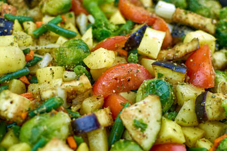 Vegetable stew, close-up. Vegetarian food, juicy vegetables. Texture of fresh chopped vegetables.の写真素材