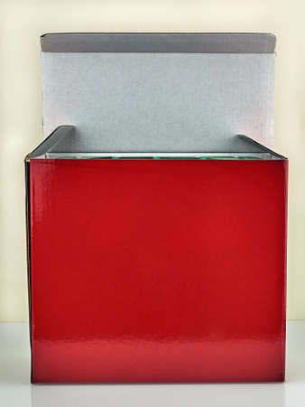Red cardboard box on a white background. Open cardboard box.の写真素材