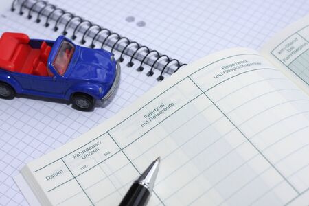 An empty logbook with the words destination, departure, date, journey time, itinerary, time