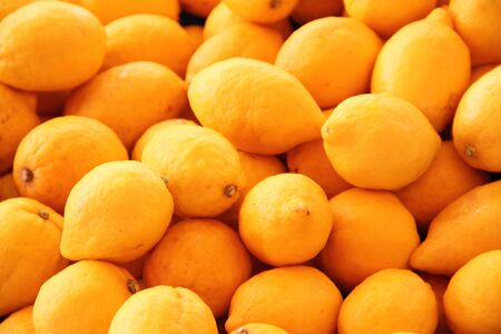 Fresh lemons at the weekly marketの写真素材