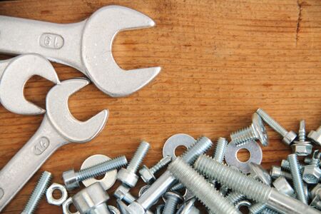 Bolts and nuts on a workbench