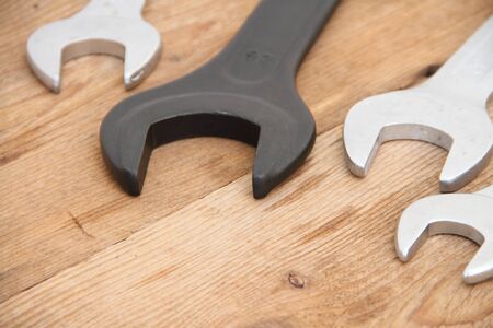 Different wrenches on a workbench