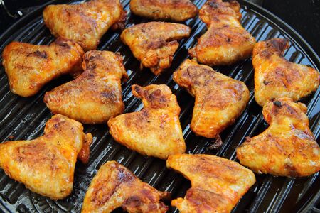 Chicken wings on the grillの写真素材