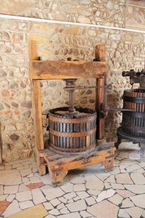 An old wooden wine pressの写真素材