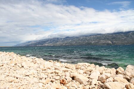Stones on the beach on the coast in Croatia