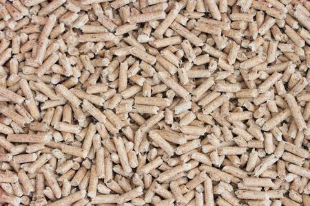 Many wood pellets as a background