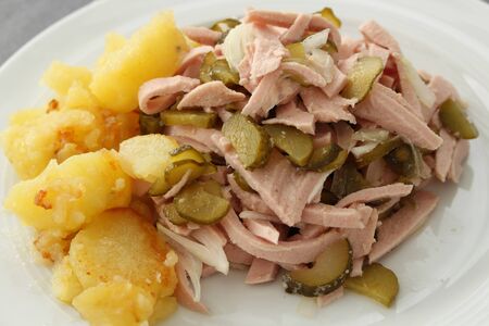 Delicious sausage salad with potato saladの写真素材