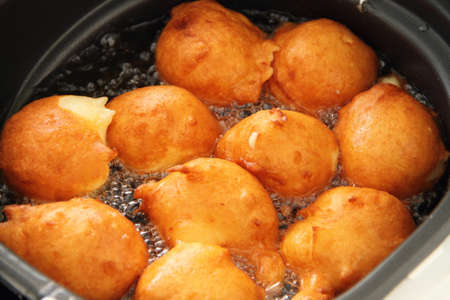 fresh donuts deep-fried in the deep fryer