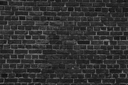 stone wall made of bricks monochromeの写真素材