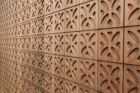 a wooden wall with a gingerbread pattern