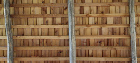 an old wooden roof with wooden beams