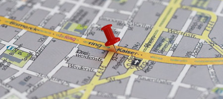 a road map with a pin