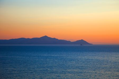 Islands in Aegean sea before sunrise, Greeceの写真素材