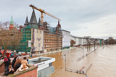 FRANKFURT- JANUARY 15 2011: Flood in Frankfurt am Main due to extremely high water in Main river.のeditorial素材