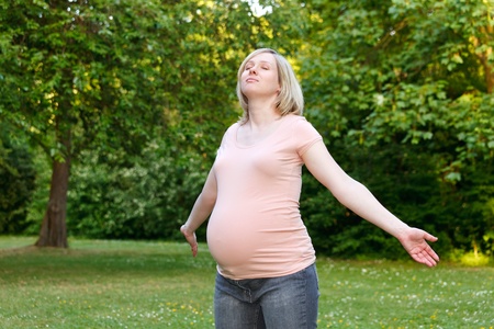 Pregnant woman in the parkの写真素材