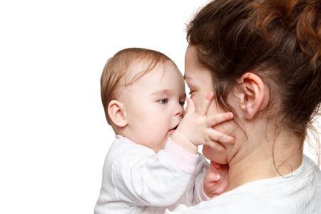 Mother holding babyの写真素材
