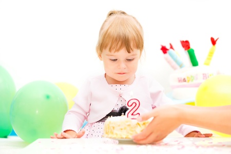 Little girl celebrating second birthday