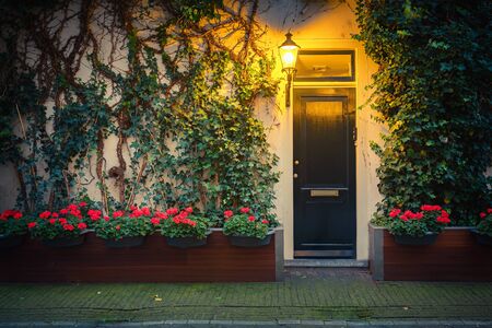 Traditional house in Amsterdam at nightの写真素材