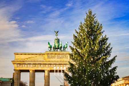 Brandenburg gate and christmas tree in Berlin, Germanyの写真素材