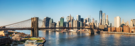 Brooklyn bridge and Manhattan at sunny day, New York City