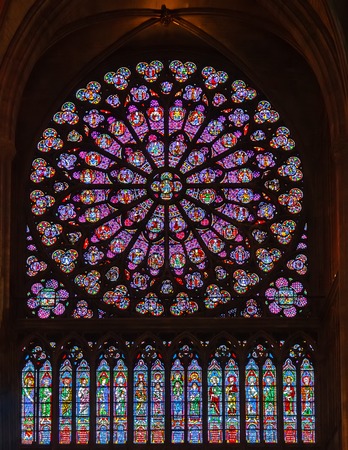 Stained glass window in Notre dame de paris cathedral, France