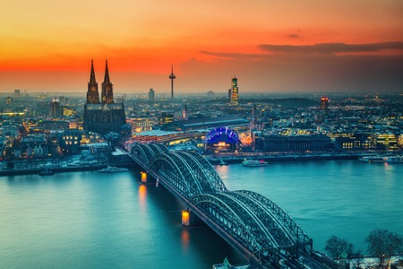 Cologne Cathedral and Hohenzollern Bridge at night, Germanyの写真素材