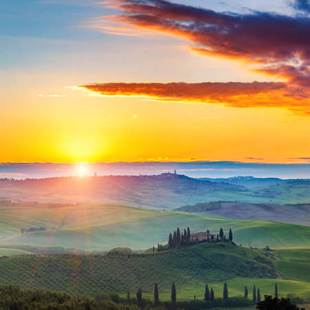 Beautiful foggy tuscany landscape at sunriseのeditorial素材