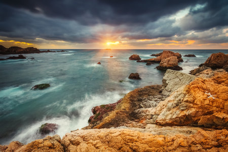 Big Sur rocks at sunset. Pacific Ocean coast in California, USAの写真素材