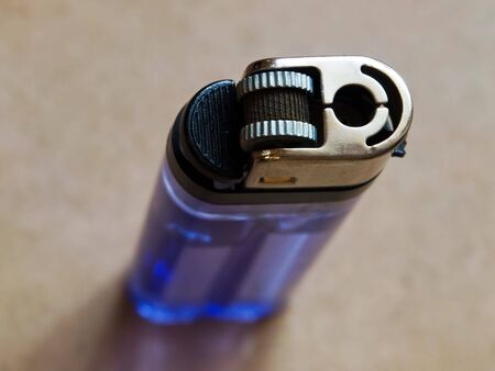 Closeup image of a transparent cigarette's lighter.の写真素材