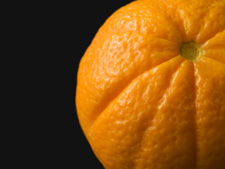 Close up of Orange peel on a black background.の写真素材