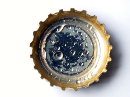 Closeup of a bottle cap on a white background.の写真素材