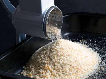 Closeup of a  kitchen utensil for the  breadcrumbs  production.