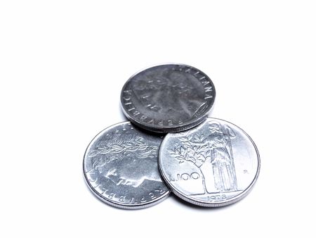  Old Italian money or coins before the euro on a white background.