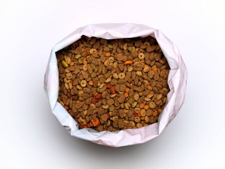 Commercial cat food in a plastic bag on a clear background.の写真素材