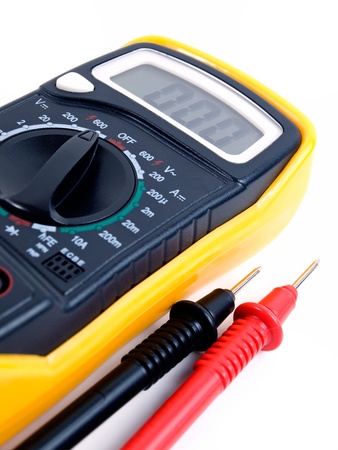 Modern digital multimeter on a white background.