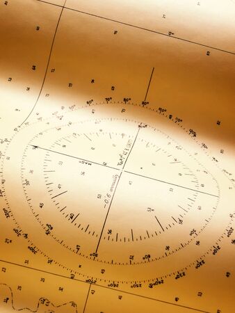 Closeup view of a wind or compass rose of some old nautical chart .の写真素材