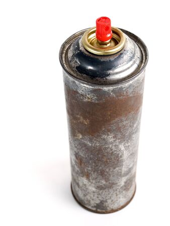 Old grungy spray bottle on a white background.の写真素材