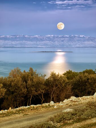 Sight on the mountain known as Velebit from the island Losinj in the evening, Croatia...の写真素材