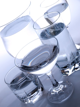 Various types of glasses full of water の写真素材