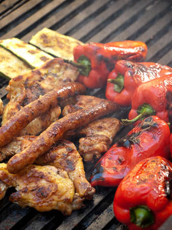 Closeup view of delicious grill with meat and vegetables の写真素材