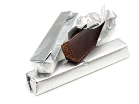 Few chocolate bars on a white background.の写真素材