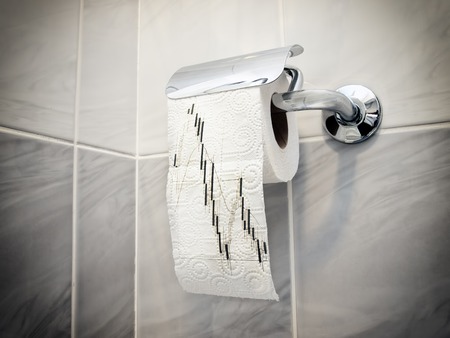 Candlestick graph printed on a toilet paper.の写真素材