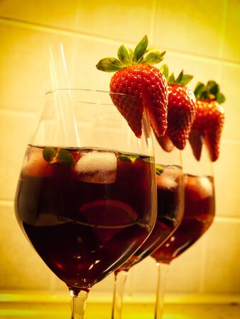 Three strawberry cocktails in a row.の写真素材